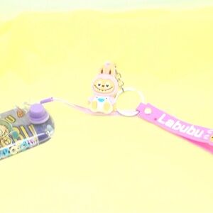 Labubu water game and keychain. New